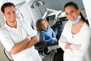 doctors and patient in chair